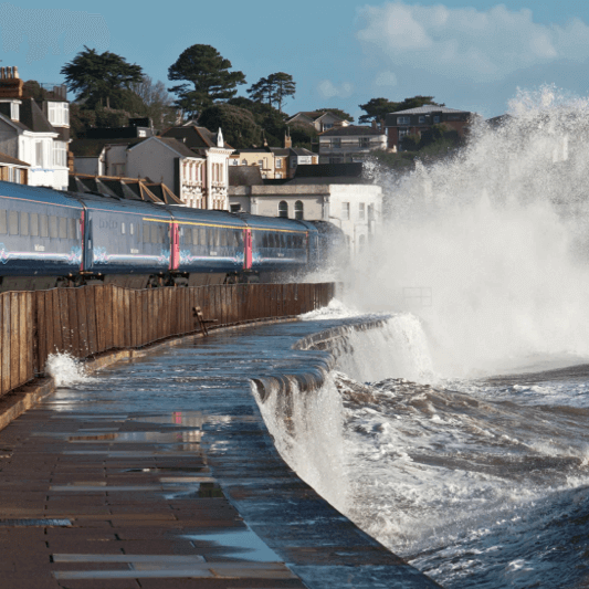 Waves crash into the railway at Dawlish - climate change will present ever greater challenges to our infrastructure