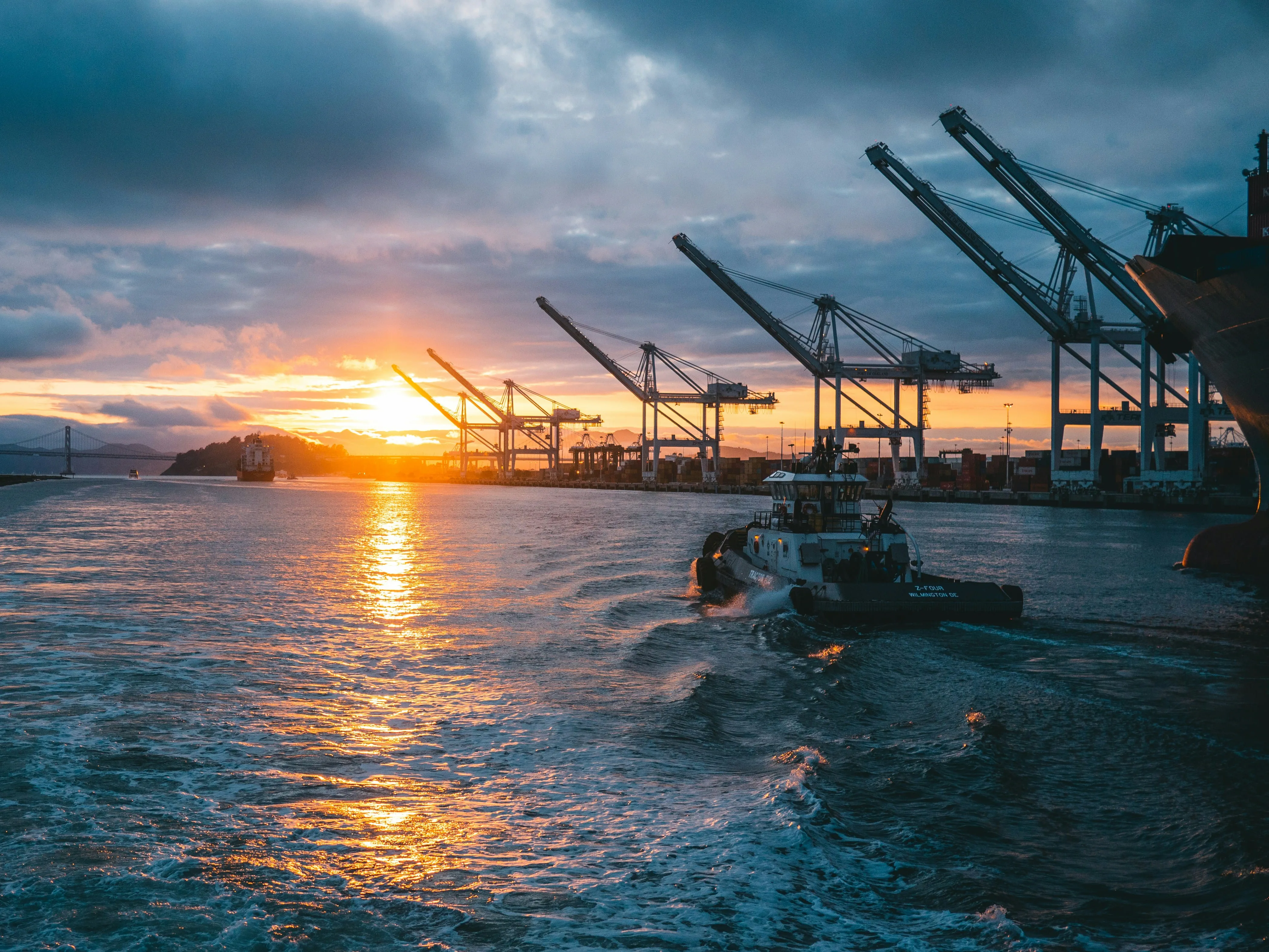 View of a boat at a port during sunset