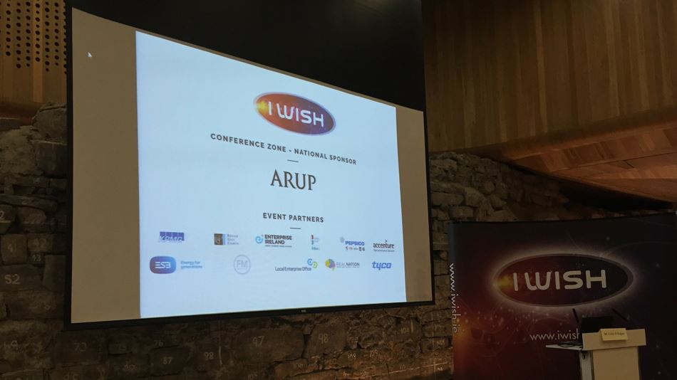 Screen at I Wish launch showing Arup as the Conference Zone - National Sponsor and showing the logos of the Event Partners