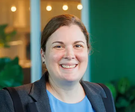 A person smiling for the camera.