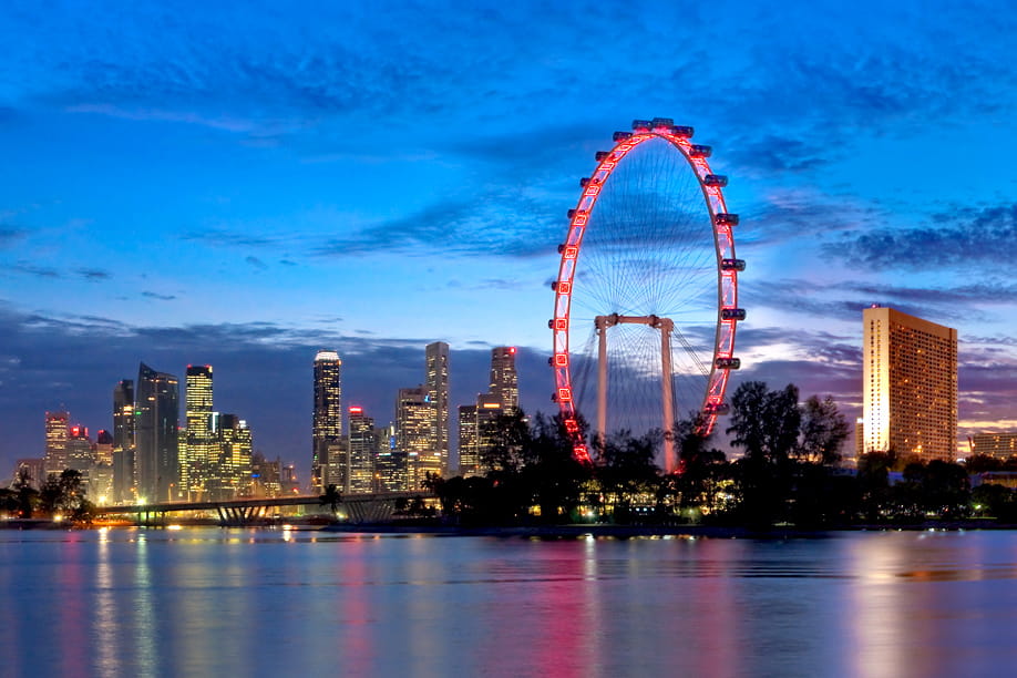 Singapore landscape at night, showing the flyer. Credit Singapore Flyer Pte Ltd.