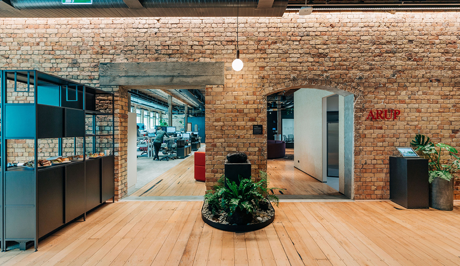 Arup’s new Auckland workplace uses responsibly sourced timber and recycled materials. Exposed bricks, natural daylight and plants are throughout the office space. The Whatu stone with continuously flowing water is surrounded by planted punga logs. 
