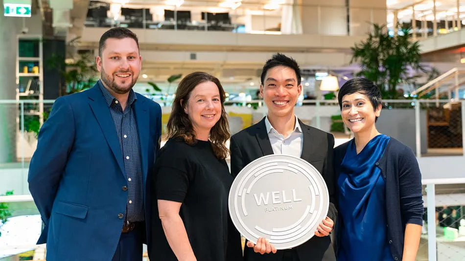 Finola Reid and Ken Fong (centre) receive the Platinum WELL Certification for Arup's Melbourne Workplace from the International WELL Building Institute's Jack Noonan and Rachel Gutter
