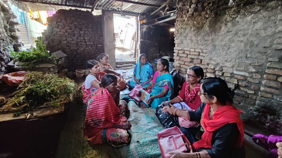 Women gathered in an informal settlement