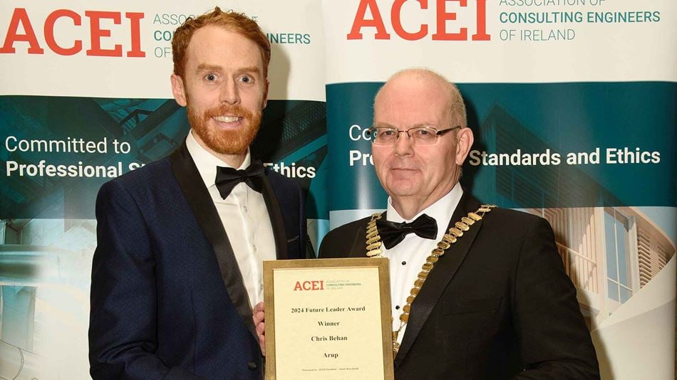 Photo of Chris Behan receiving the ACEI Future Leader Award 2024 from James Kavanagh (ACEI President).