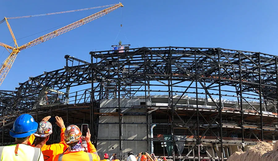 The Las Vegas Stadium's final structural steel bar being lowered into place