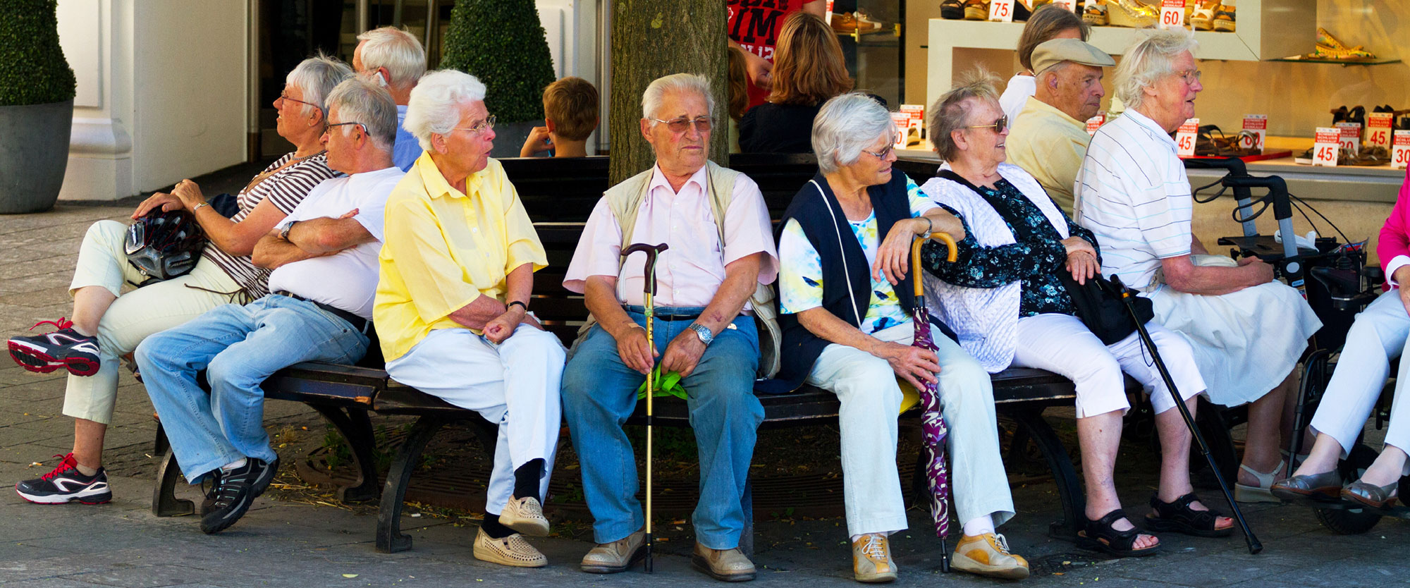 Senior citizens sitting under a tree in Baden-Baden