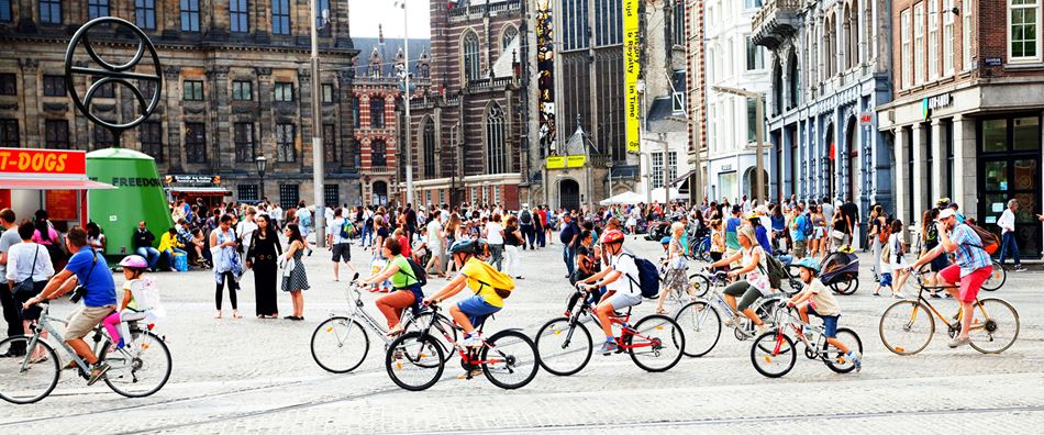 Many cycling kids in Amsterdam
