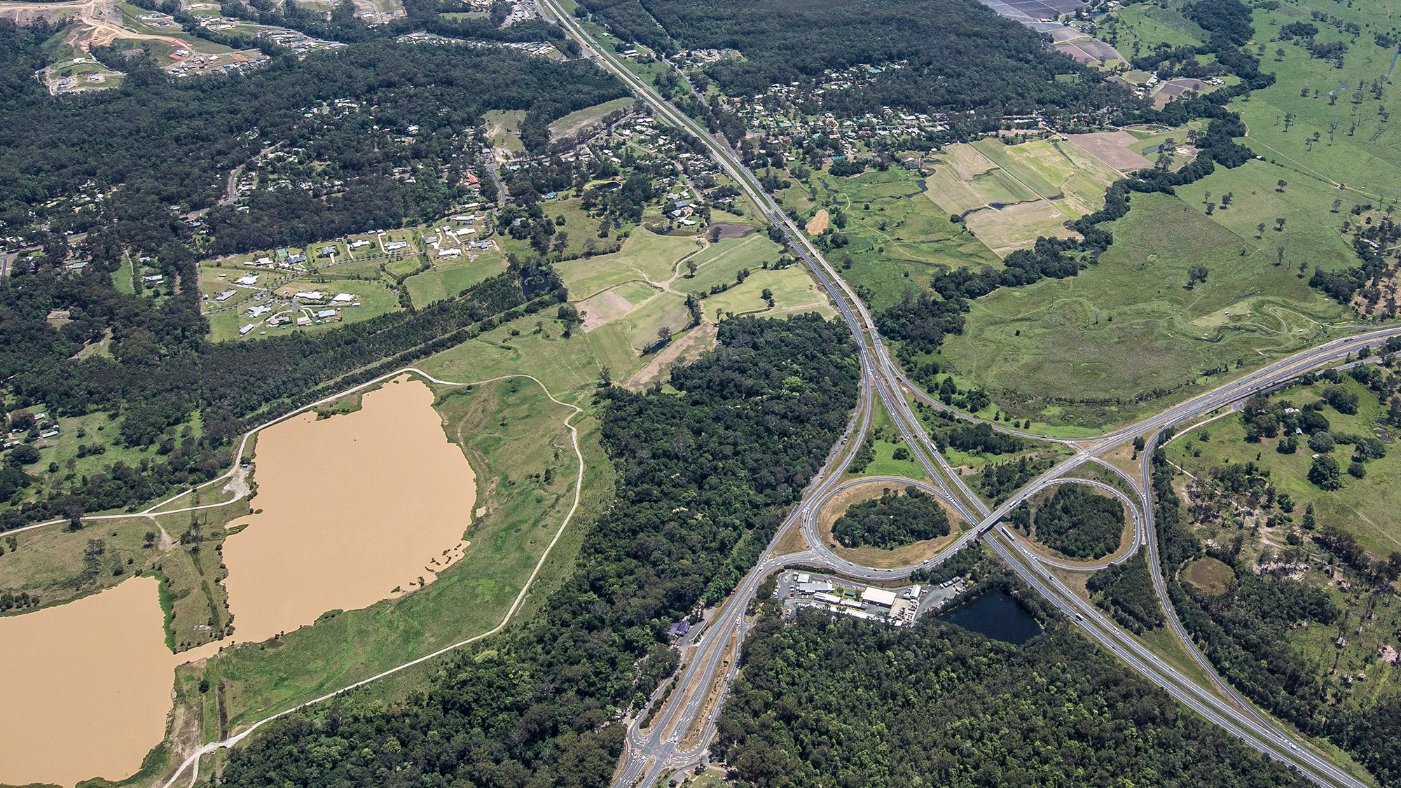 Aerial view of the Caloundra Road interchange being upgraded as part of the Bruce Highway Upgrade Caloundra Road to Sunshine Motorway project