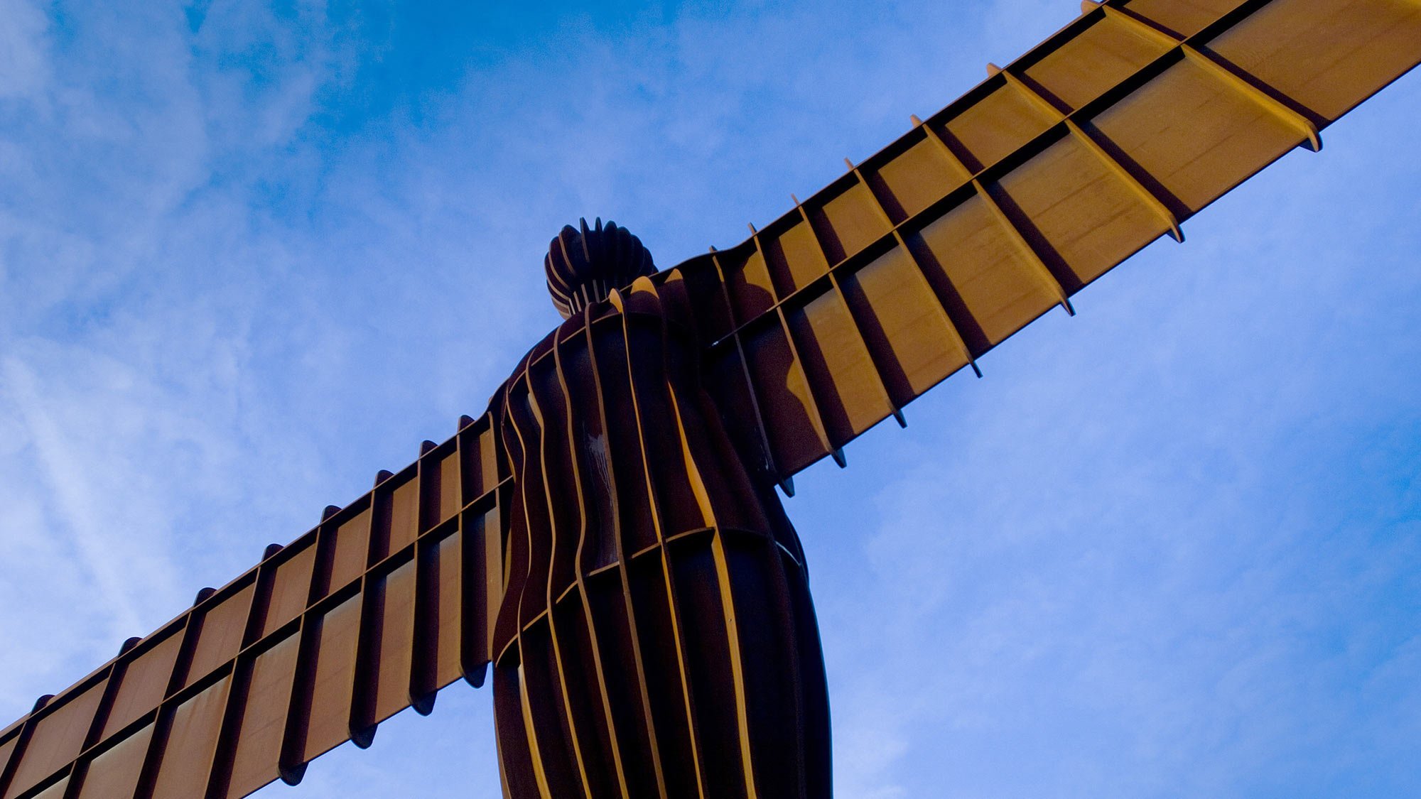 The Angel Of The North showing tilted wingspan embrace