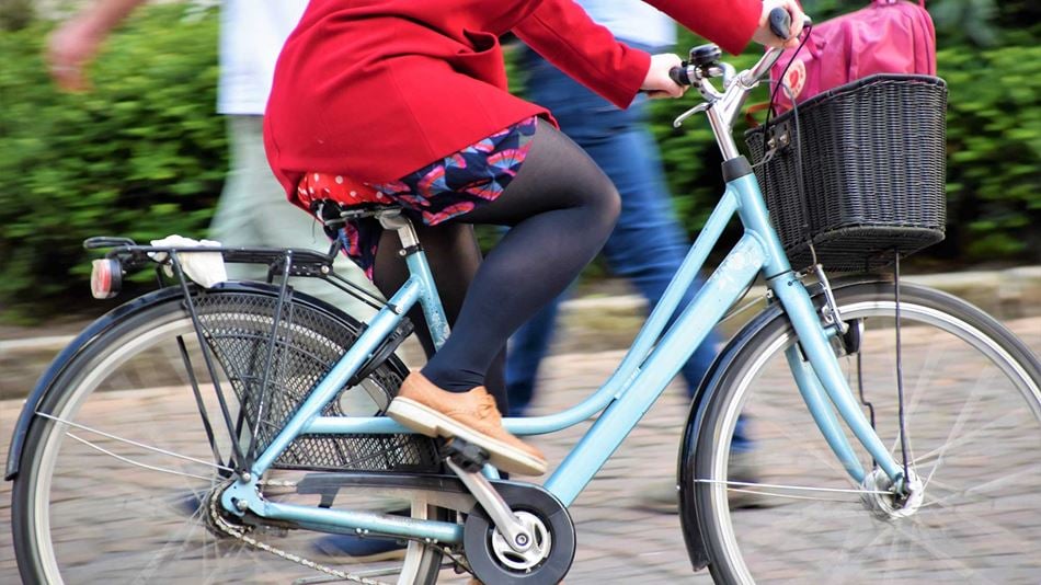 Close up shot of a woman cycling 