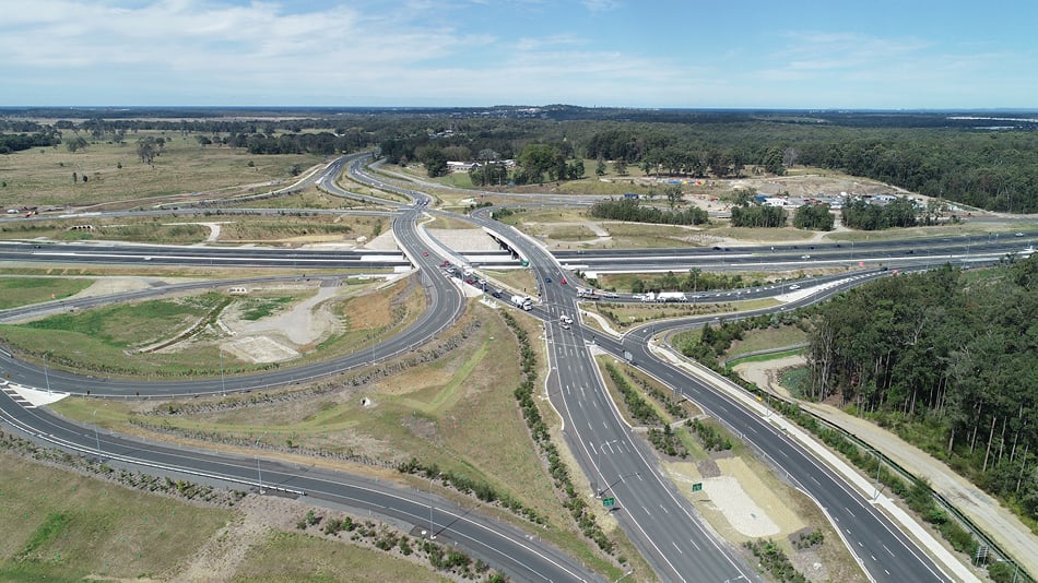 Aerial photograph of a major highway intersection with a Diverging Diamond Interchange design
