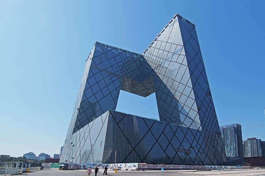 CCTV new headquarters is described as a 'three-dimensional cranked loop'.