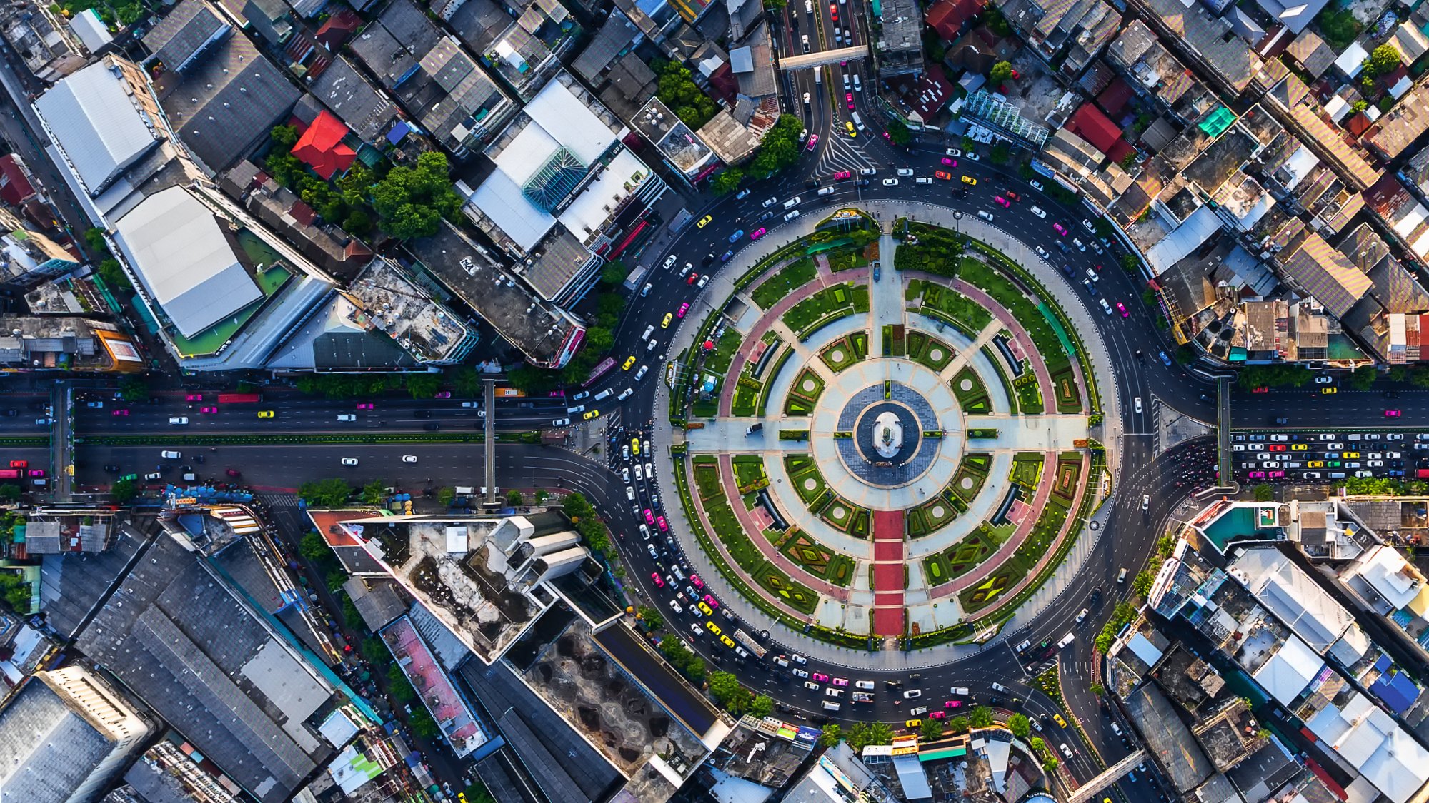 Arial view high above big busy roundabout in major city