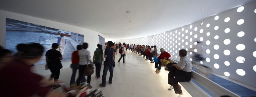 The looping ramp serves as a continuous exhibition area.