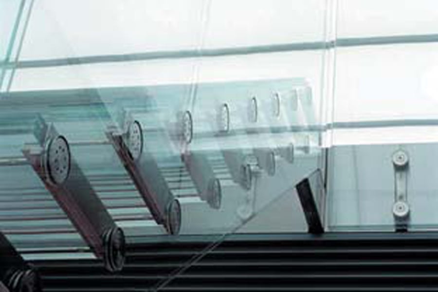 Arup developed the original concept of a steel framed and glazed staircase into one entirely of structural glass.