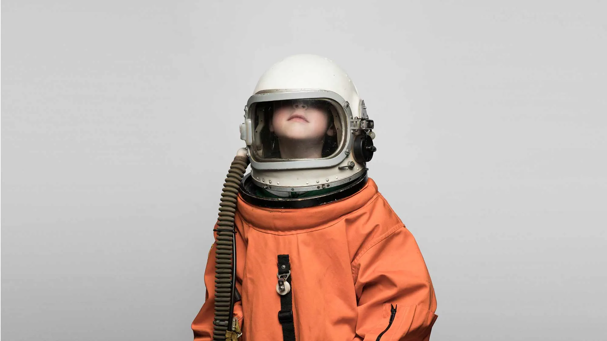Kid wearing a spacesuit 