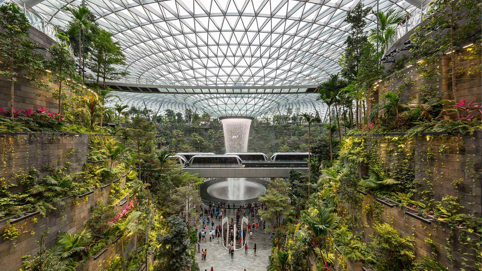 View of Rain Vortex and sky trains in Jewel Changi Airport