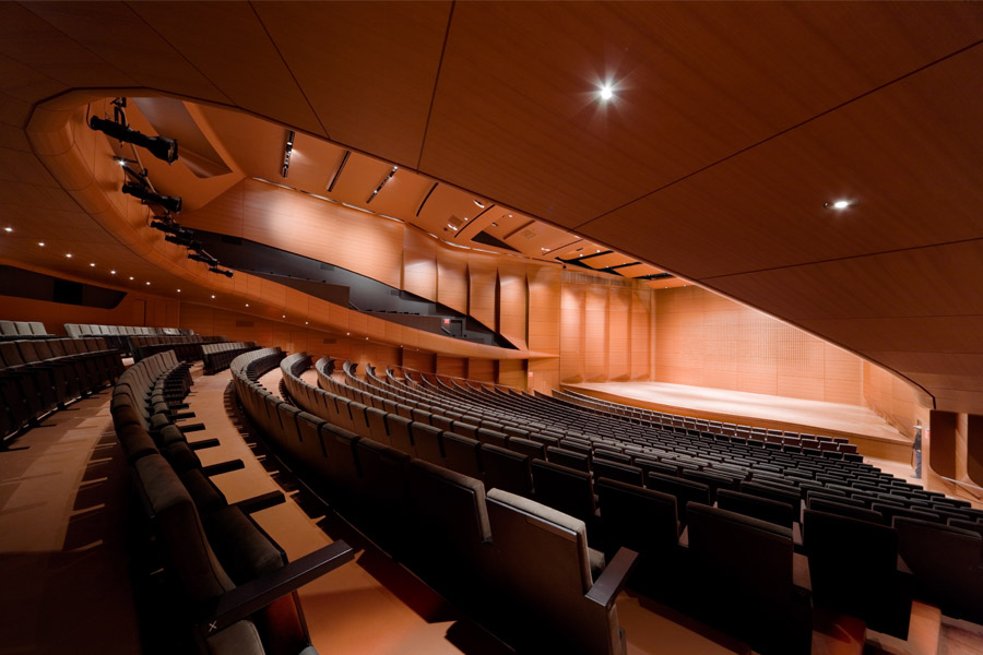 The interior wall panels of Alice Tully Hall are a unique laminate of super-thin wood veneer on resin panels.