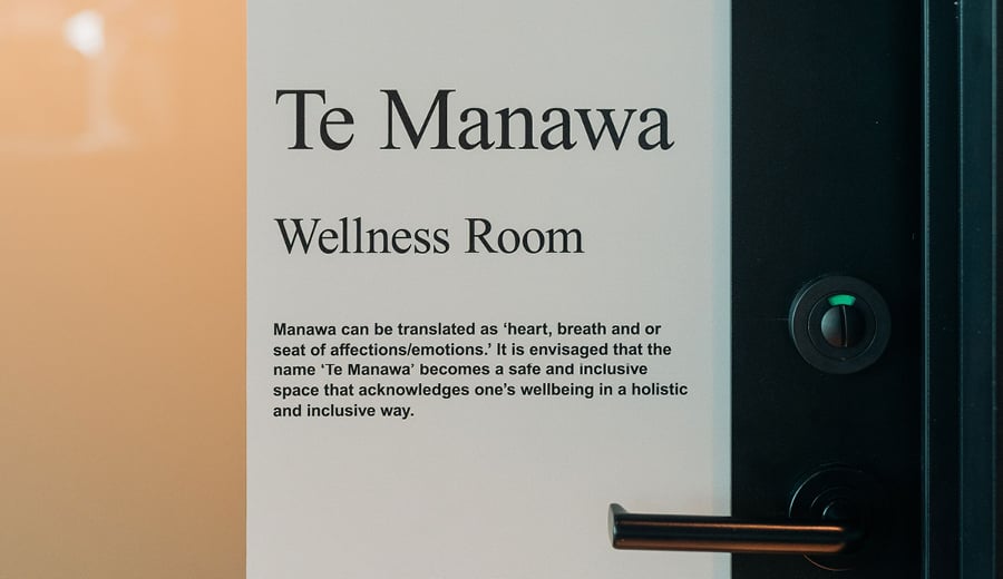 Māori signage about a Wellness Room on a door in a worplace