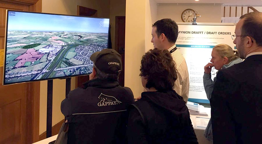 Members of the public viewing the 3D model of the proposed new section of the M4 around Newport