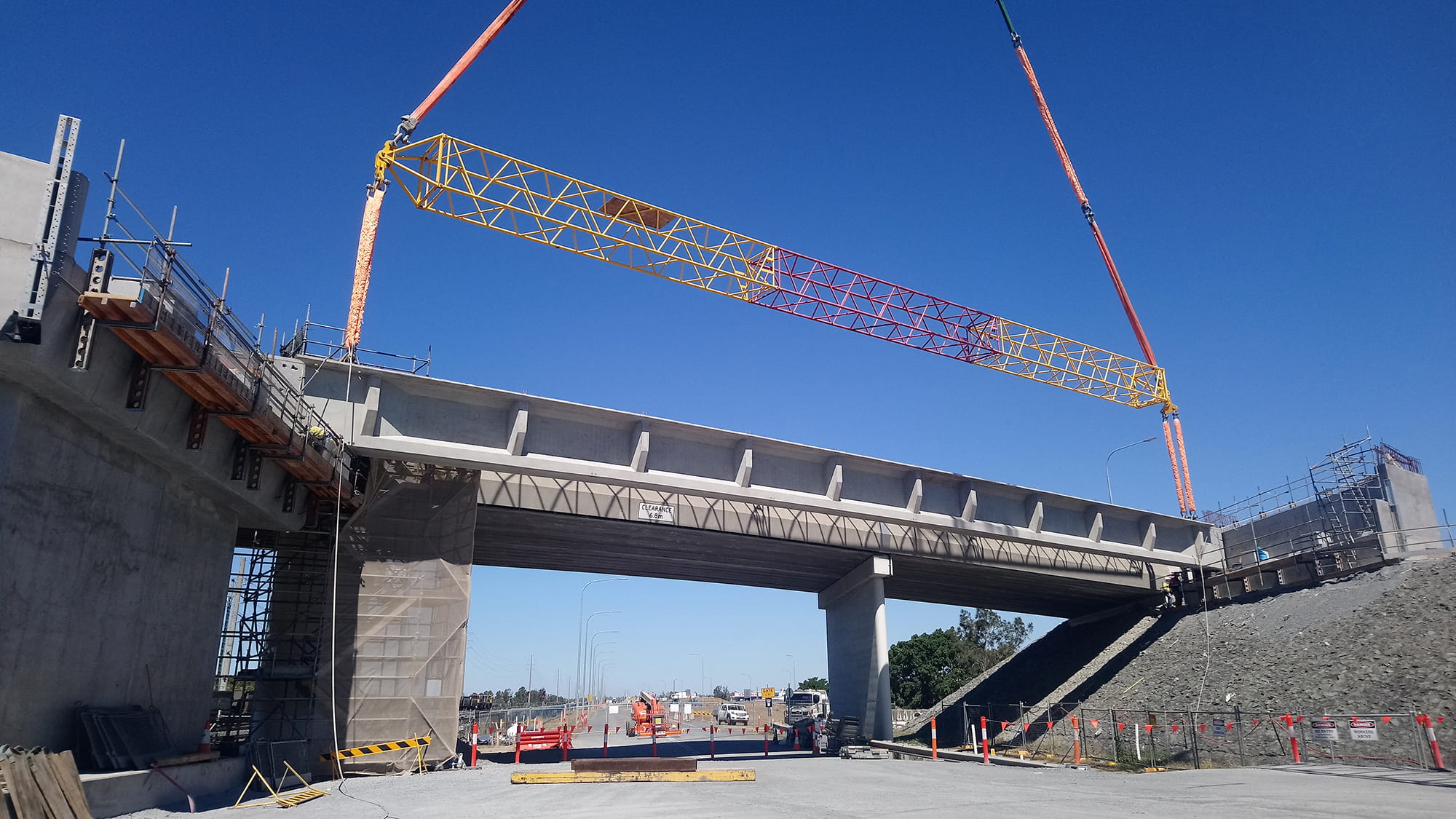 View from the ground of the installation of a 46m Quickcell Super Girder as part of the Port Drive Upgrade project
