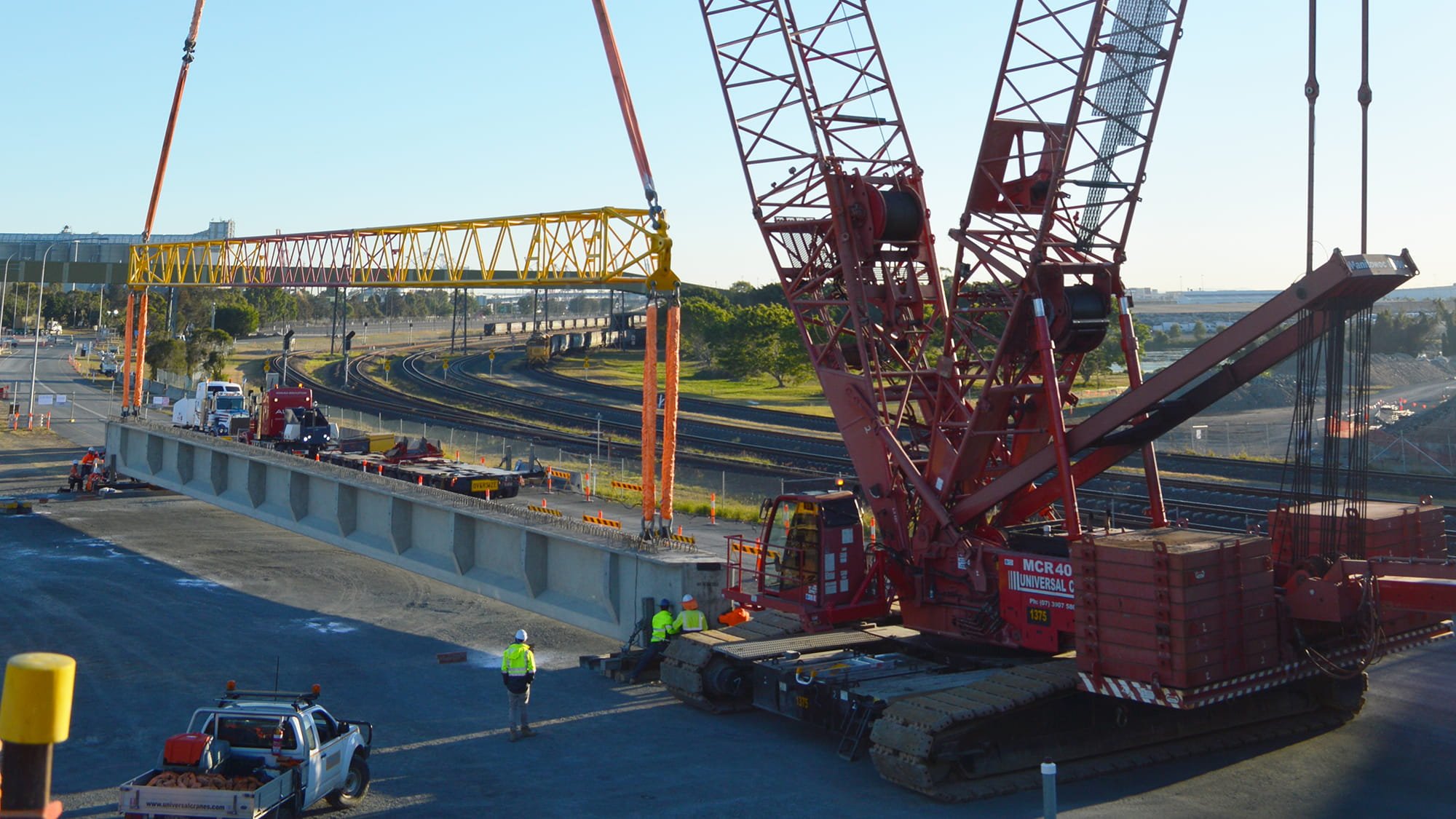 A 46m Quickcell Super Girder is unloaded at the Port of Brisbane as part of the Port Drive Upgrade project