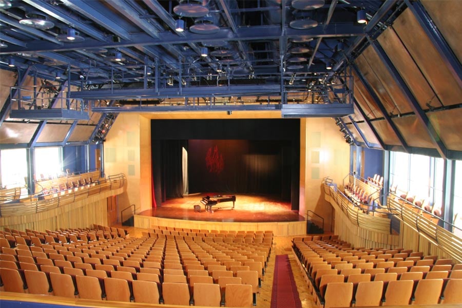 The auditorium was enclosed to improve sound isolation.