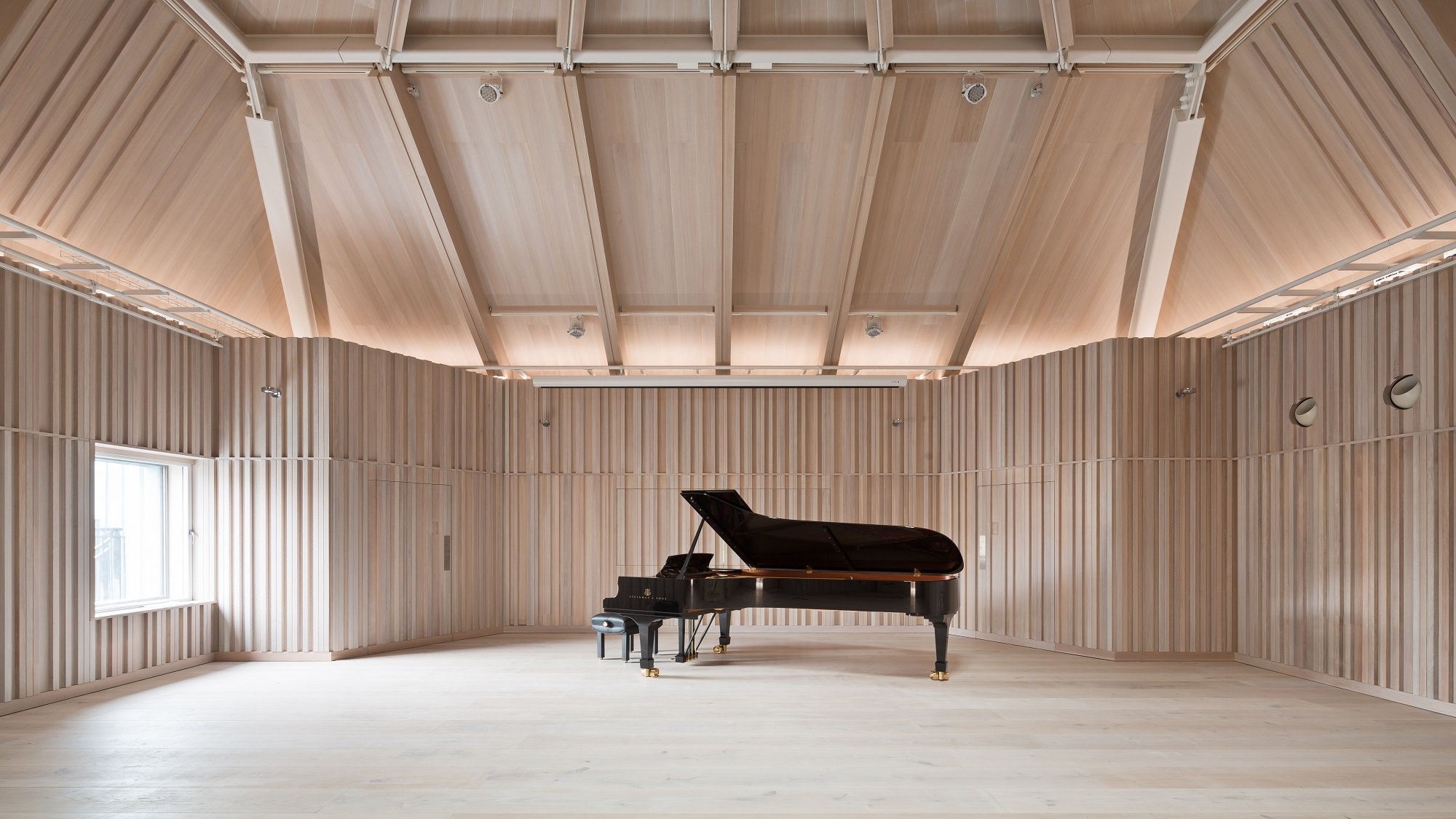 Piano in a white studio