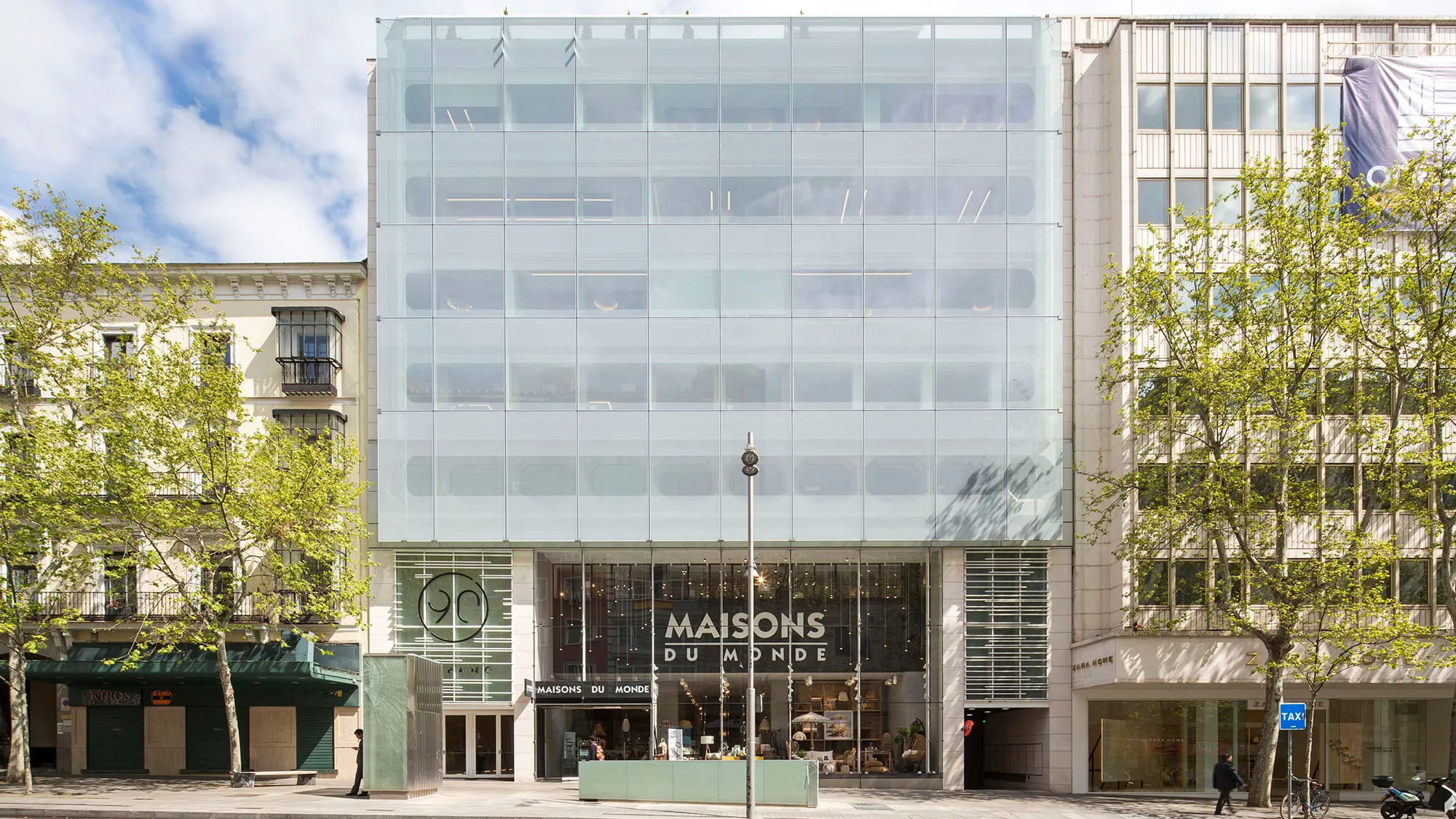 15-meter-long glass storefront running up 9 m vertically