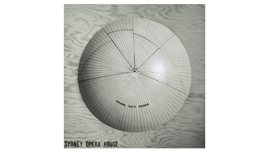 An archival photograph of a wooden sphere shape
