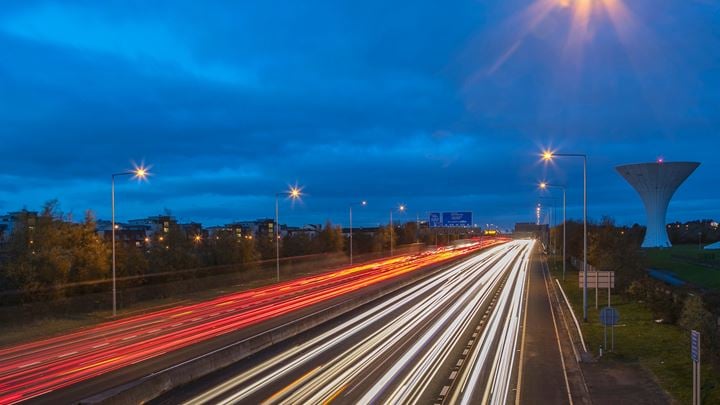 Time lapse of car lights at night on M50 motorway