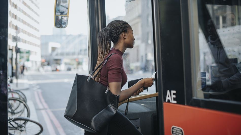 Woman entering on a bus in Wales