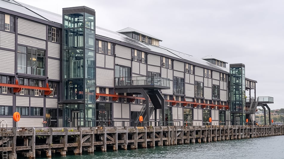 Close up view of side of Pier 4/5 in Sydney Harbour with new lifts and balconies.