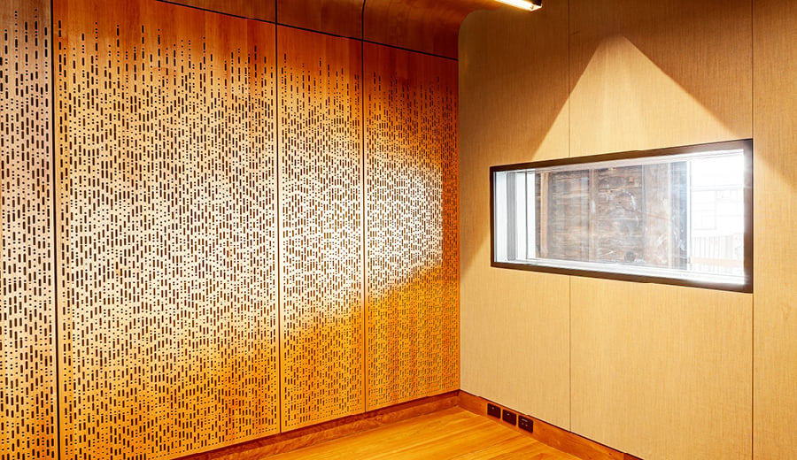 Inside a recording studio at Walsh Bay Arts Precinct. The walls are made of timber panels embedded with Morse Code.  
