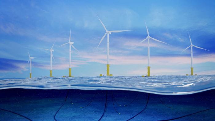 Shutterstock photo of proposed floating offshore wind farm, with wind turbines visible in the sea.