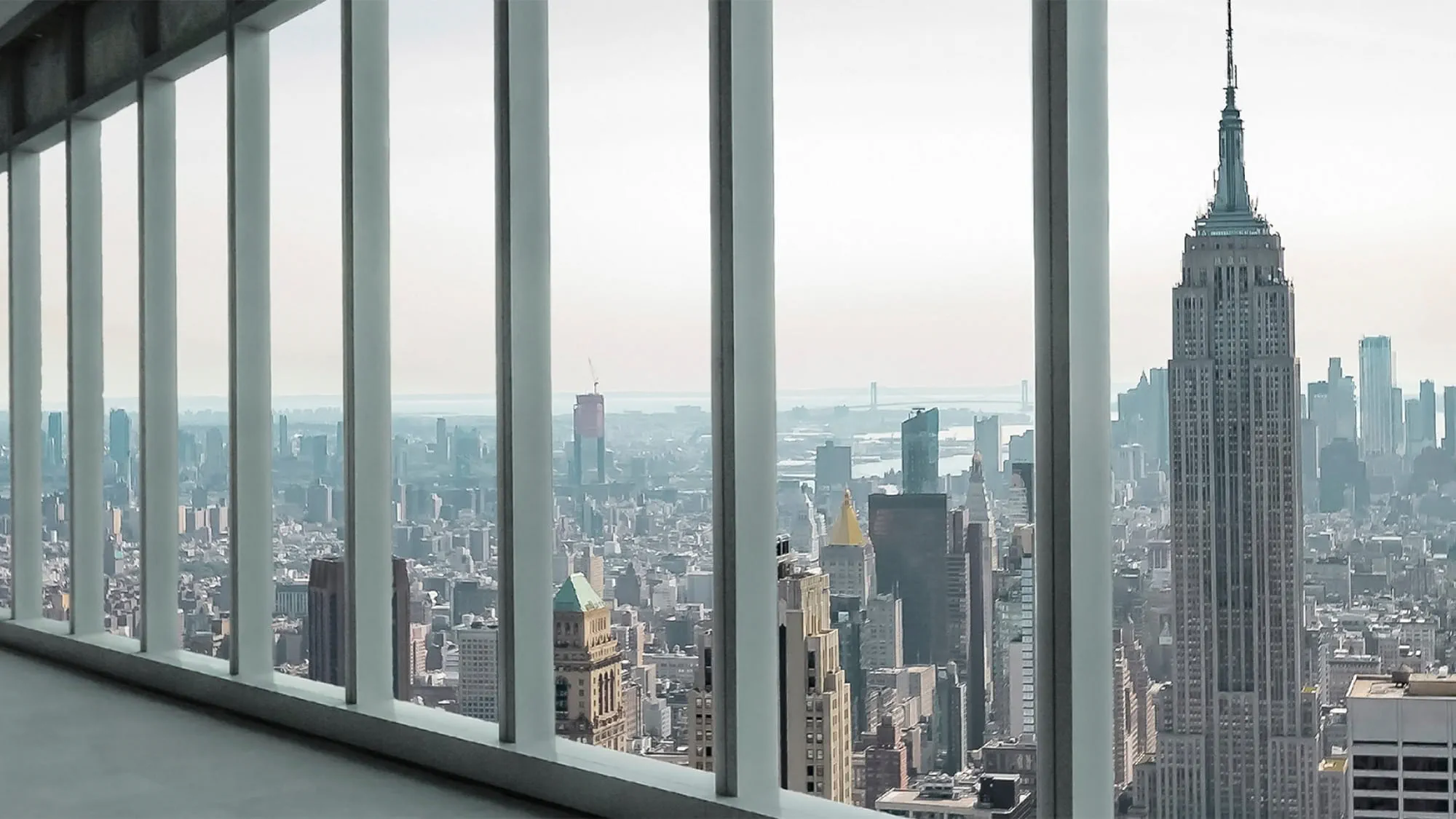Interior view from office building shows New York City skyline