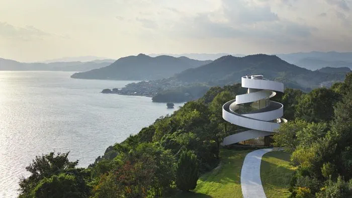 Inspired by a flying ribbon, the chapel overlooks the Inland Sea of Japan.<br/>
															© Koji Fuji / Nacasa & Partners Inc.
														</br>
														