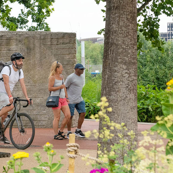 People walking and cycling in a city