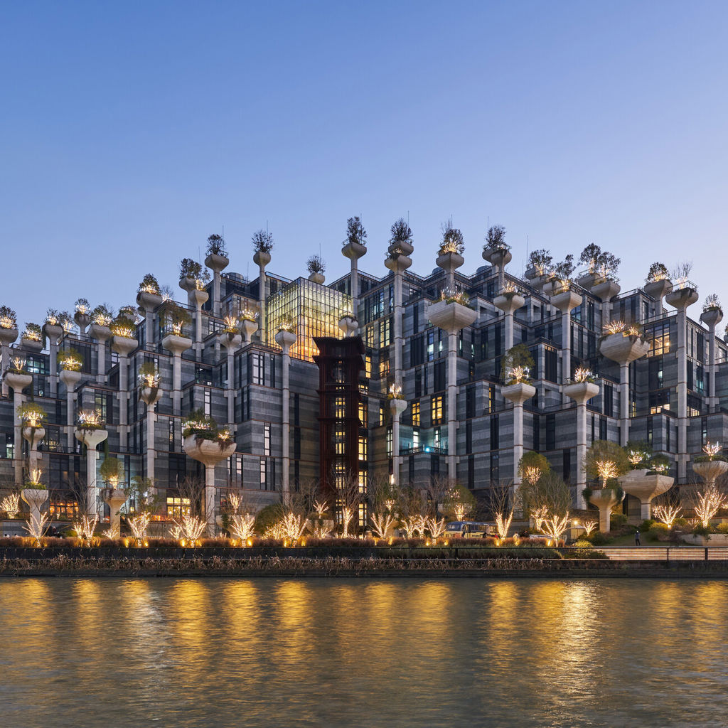A city with lights on at night.