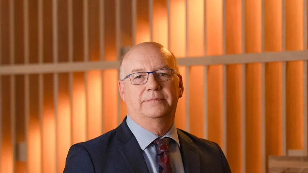 A man wearing glasses.