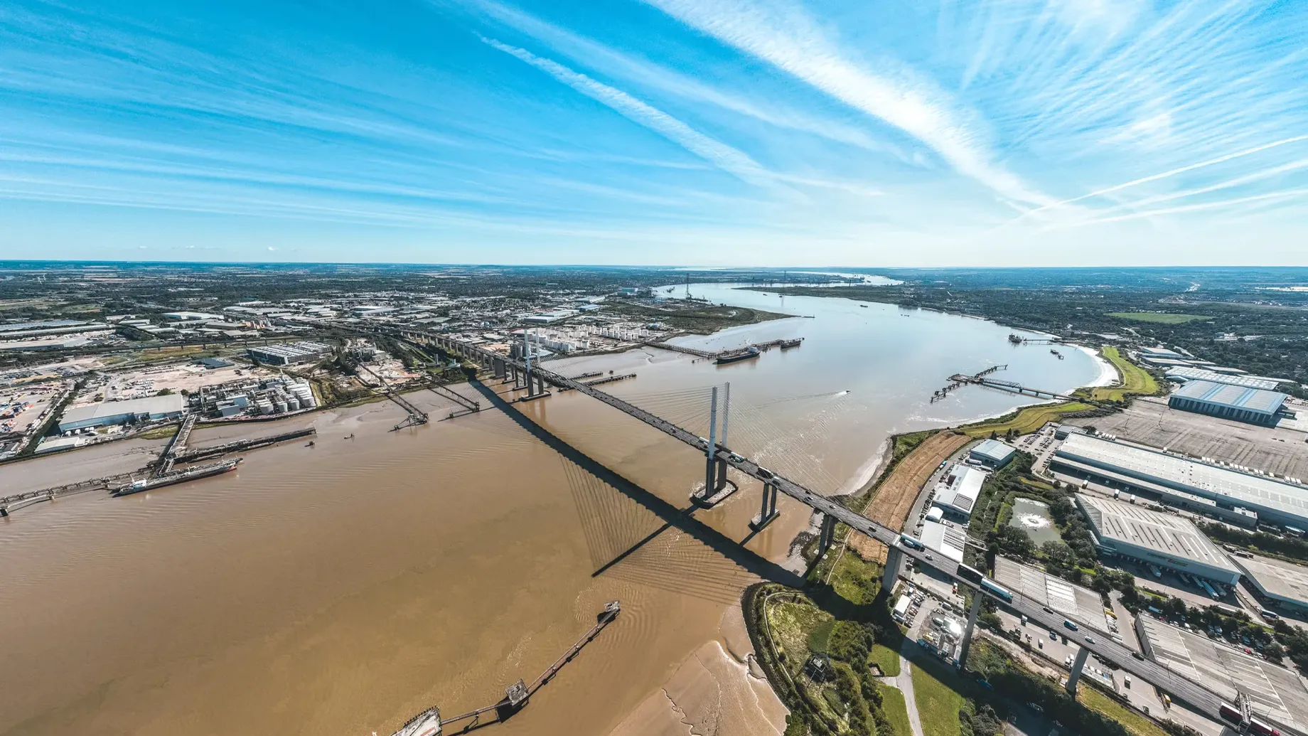 A large dam with a river running through it.