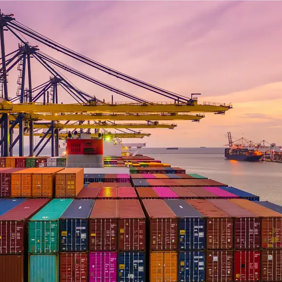 A cargo ship at a port.