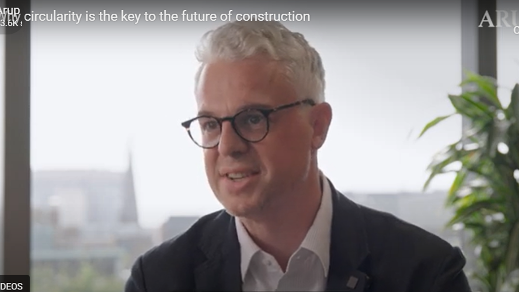 A man wearing glasses.