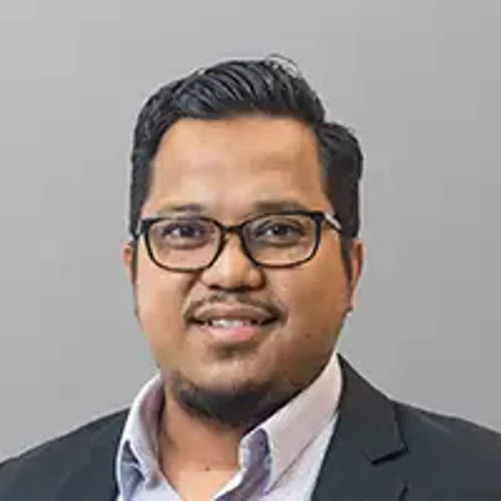 A man wearing glasses.