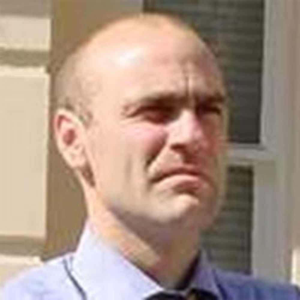 A man with a mustache.