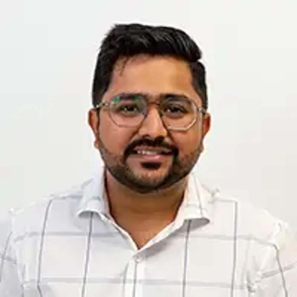 A man wearing glasses.