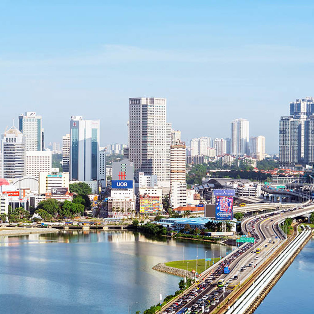 A city skyline with a river.