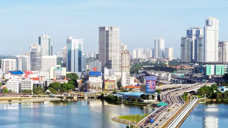 A city with a river and a bridge.
