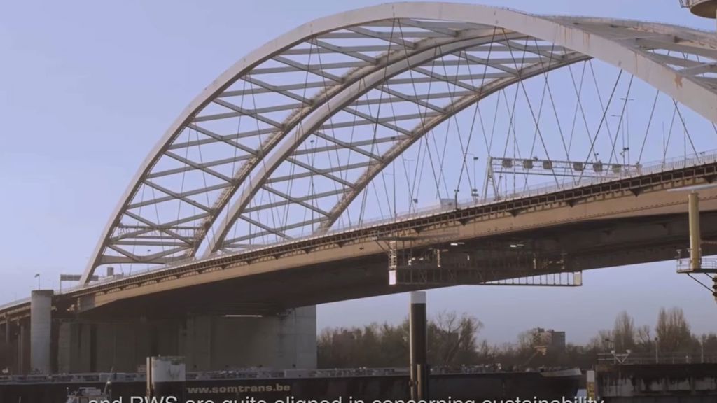 A bridge with a metal frame.